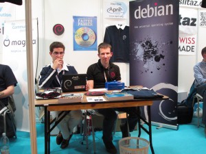 The Debian Booth (Tanguy on the left, Raphaël on the right)